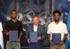 Presidente ejecutivo de Banreservas, Leonardo Aguilera, firma un acuerdo con los baloncestistas Jean Montero y Andrés Feliz, como embajadores de la marca ante el mundo.
